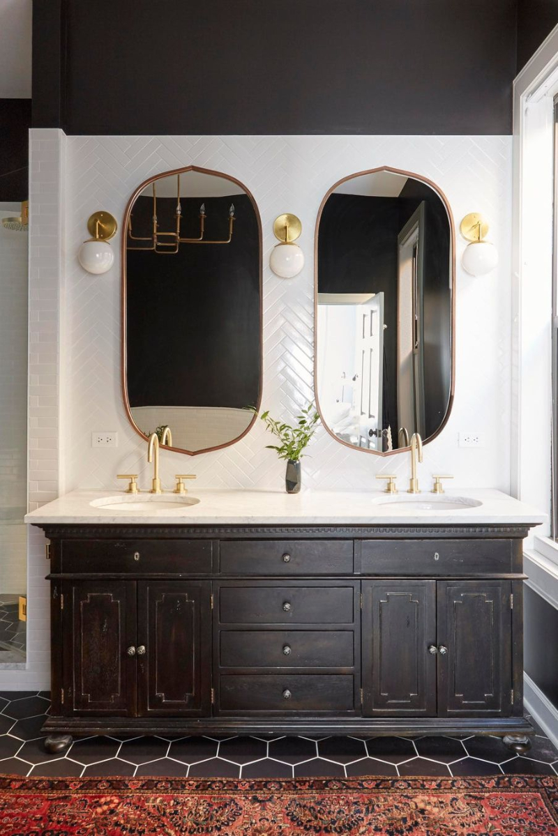 Bathroom Design Trends Green and Black Bathrooms to Astonish black furniture, white marble surface and oval mirror