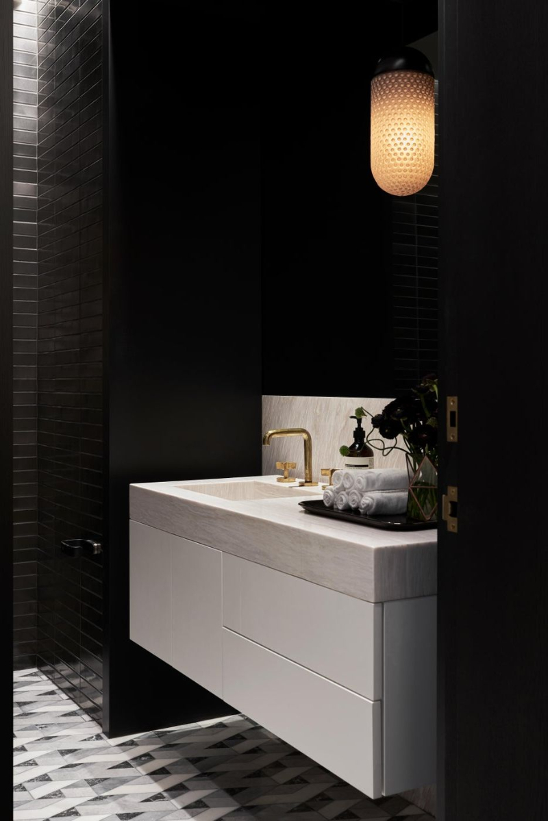 Bathroom Design Trends Green and Black Bathrooms to Astonish dark and moody bathroom with white cabinet