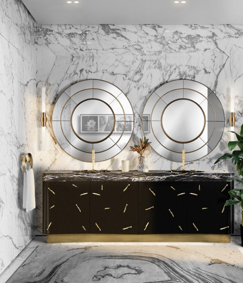 Washbasin Designs That Will Make Your Bathroom Shine. This bathroom design includes the Baraka Washbasin, the Tycho Wall Lamp, the Crown XL Mirror, the Koi Towel Ring.