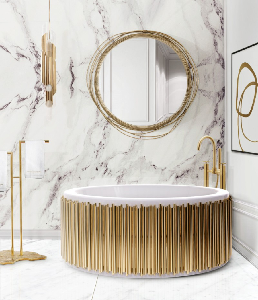 Bathtub with golden tubes and a bathroom design with a cross grey surface.