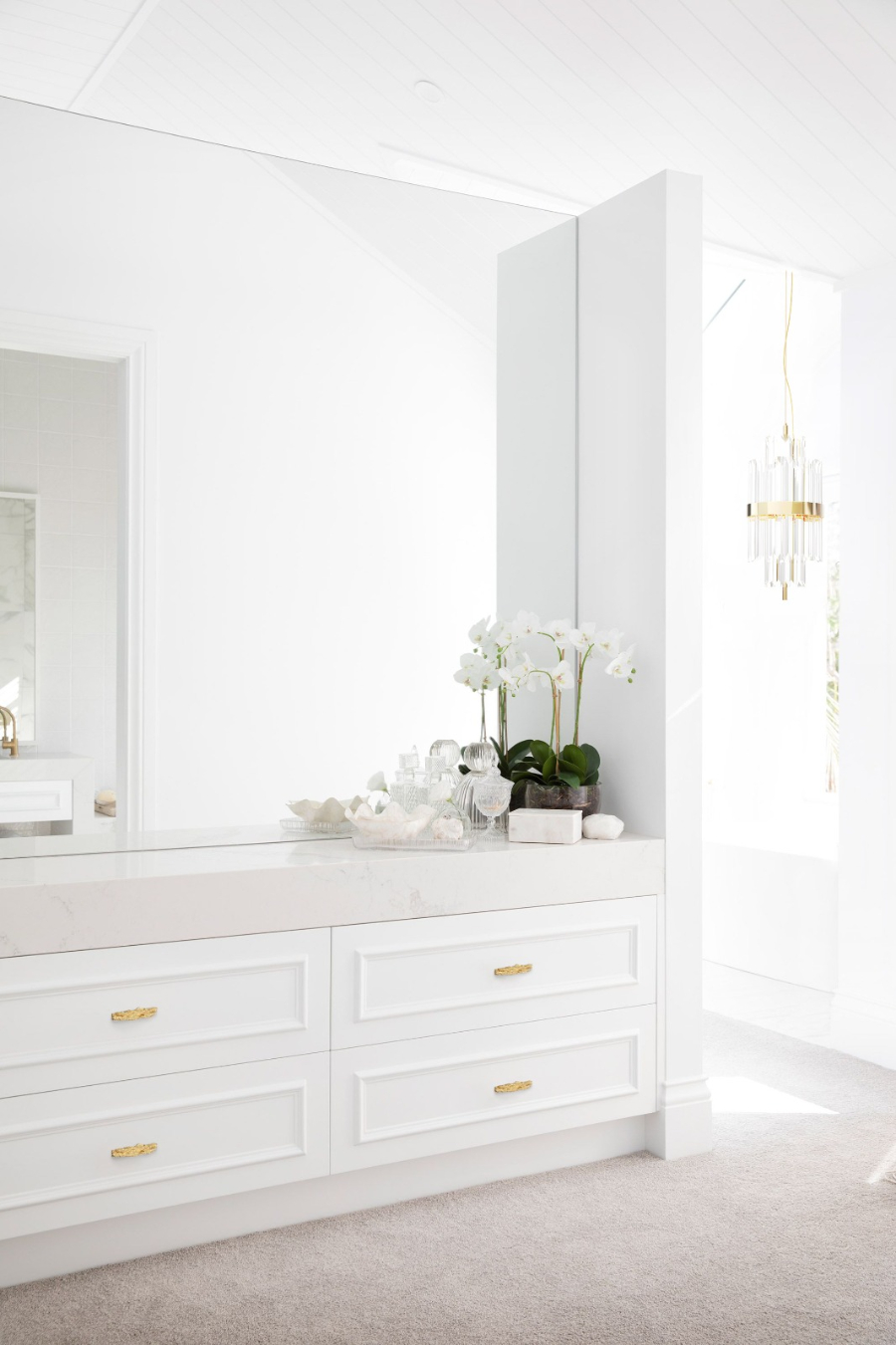 Bathroom modern interior design with white marble tones.