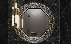 black marble modern bathroom with round marble mirror and a black washbasin (1)