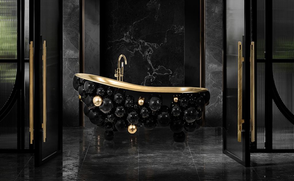 Dark contemporary master bathroom featuring the Newton Bathtub by Maison Valentina, a sculptural black and gold centerpiece with subdued lighting for luxurious ambiance.